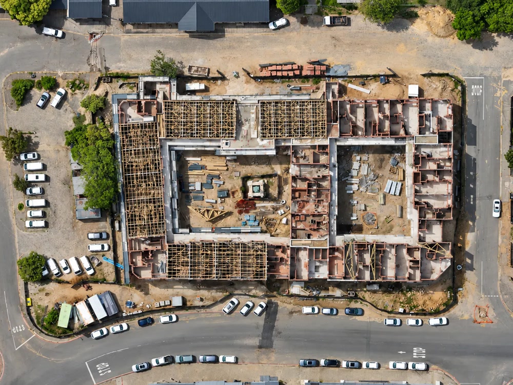 Construction progress sequence, framing through to completion with rooftop solar