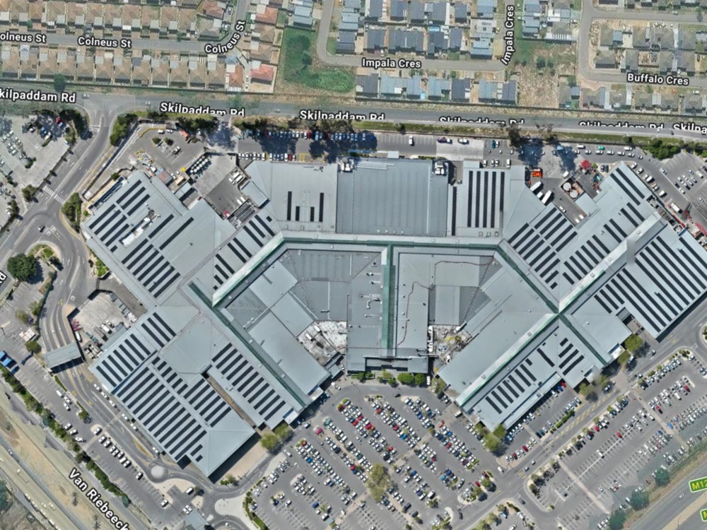 Retail mall rooftop, before and after solar installation
